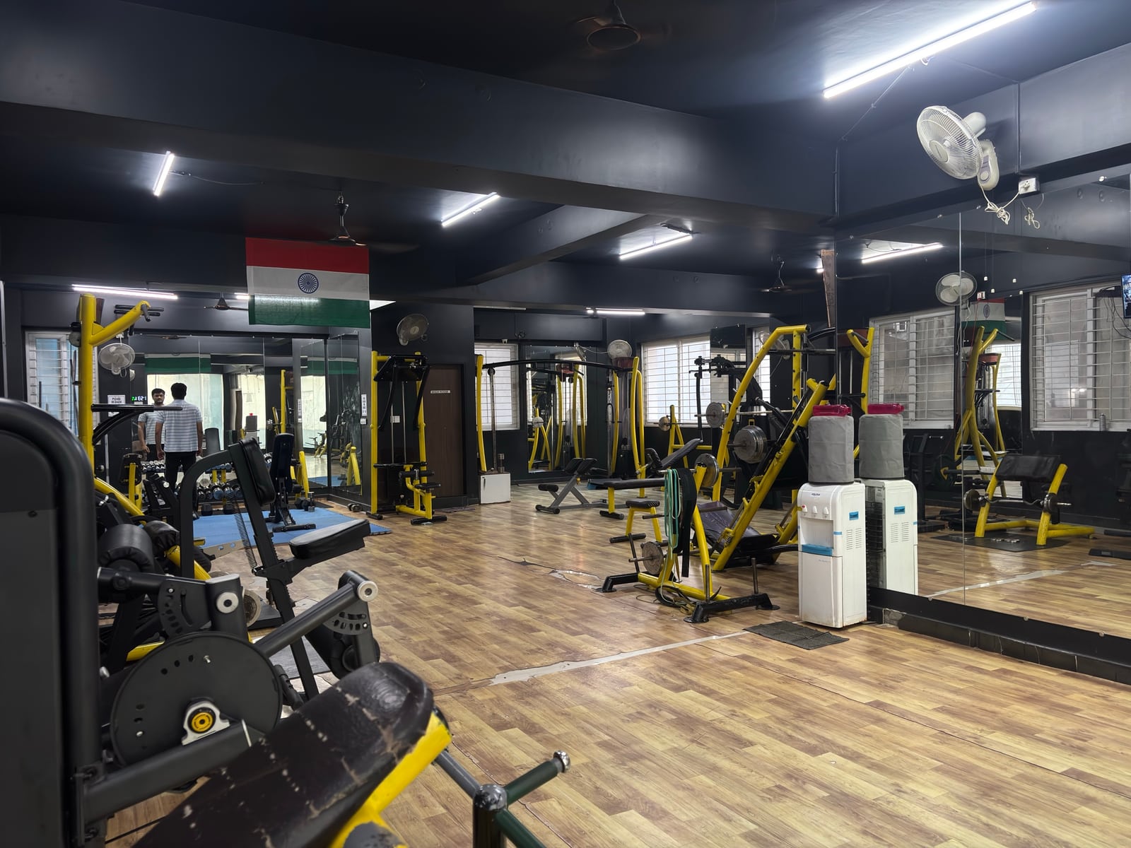 Resistance machines and open training space on IMFIT’s strength floor in Madhapur